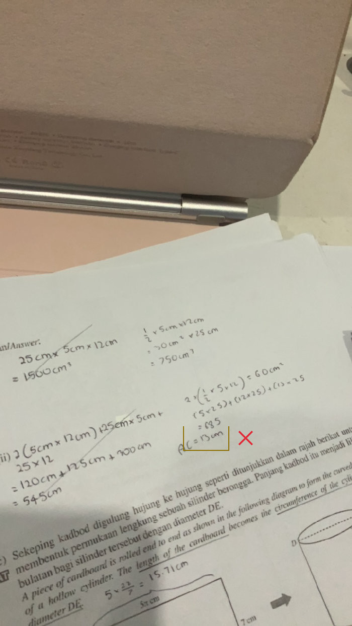 The calculation of the prism's surface area ends with an inaccurate addition total.